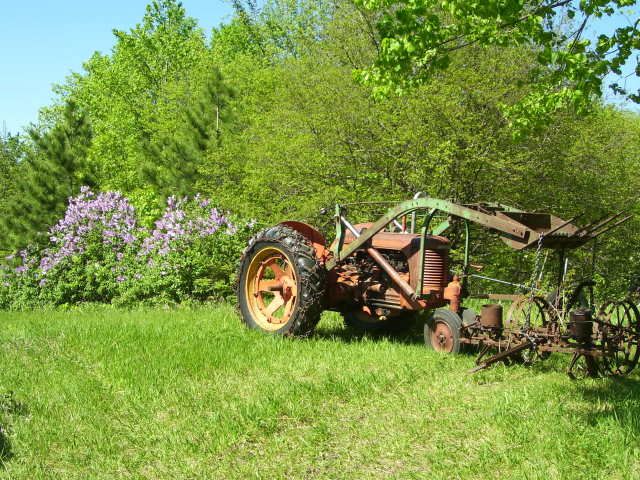 Tractor and JD horsedrawn planter