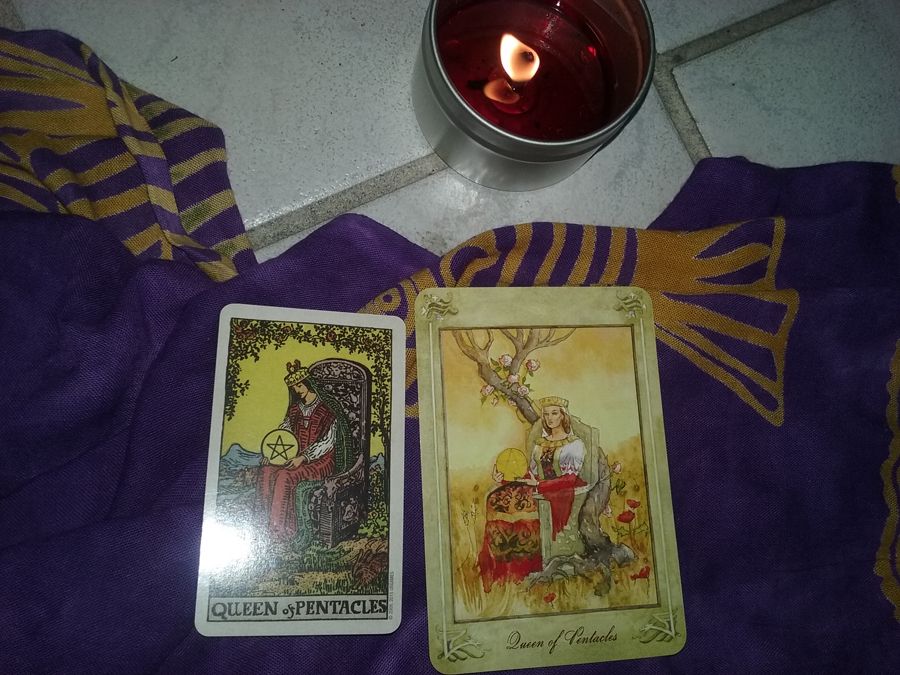 queen of pentacles. Cards by Llewellyn Tarot, and the Smith-Waite Tarot Deck by US Games ohoto by Juli D. Revezzo; candle by Wytch of the North
